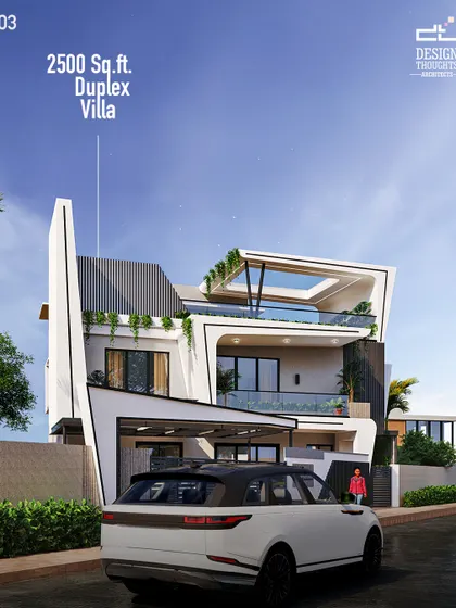 A detailed look at the modern home in Odisha, showcasing its blend of functional comfort and modern aesthetic. The lush green elements and large windows create a seamless connection with the outdoors.