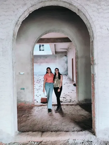 Two of our architects framed by one of the many arches at our Mangalore site. Regular site inspections are a critical part of our process, ensuring the design is executed correctly and resolving any challenges that arise.