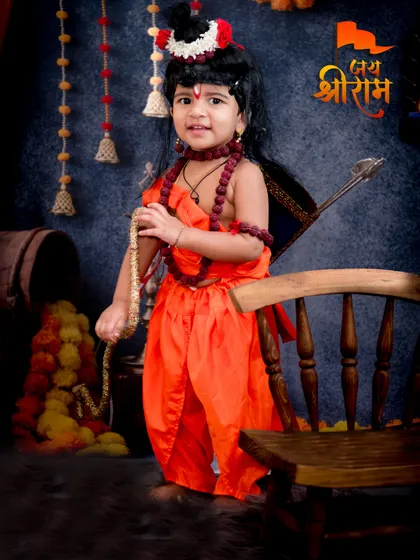 Another powerful portrait from our Lord Ram themed session. The "Jai Shri Ram" text adds a devotional touch to this image of the child in traditional attire.