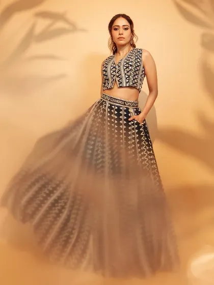 The full look of this custom SVA Couture lehenga. The movement in the skirt is just incredible, perfect for a dramatic promotional shot.