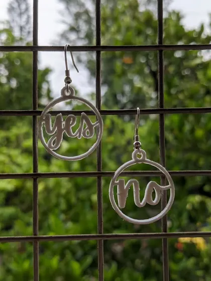 We've been making these custom 3D printed earrings for a while, and now you can too! This poster announces our "Doodle to Keychain" workshop, a subsidized session during our open house.