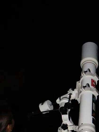 The powerful telescope pointed towards the night sky, ready to reveal the wonders of the universe.