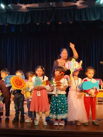 Another beautiful shot from a Children's Day school event. Our tellers use interactive activities like puppet making to ensure the story stays with the children long after it's told.