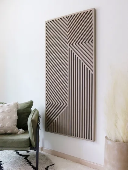 A side view of the 'Ethnic Mirage' panel, emphasizing its slim profile and the subtle 3D effect of its carved lines.