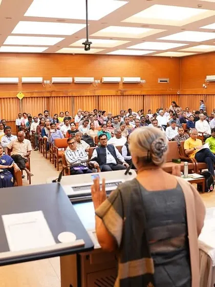 Addressing a full auditorium at the Bhabha Atomic Research Centre, sharing practical yogic wisdom with employees and their families.
