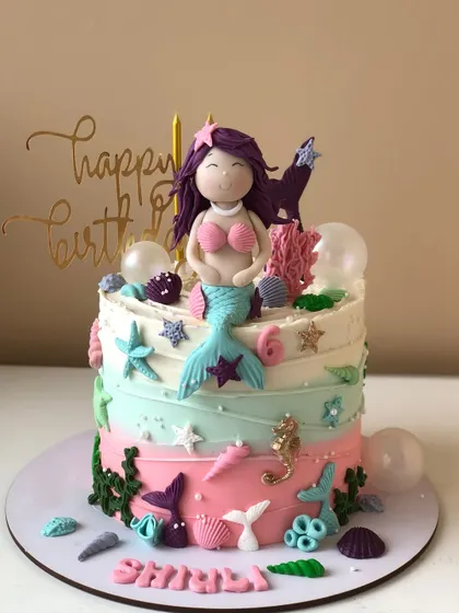 A single-tier version of my popular mermaid cake, perfect for smaller celebrations but with all the same magical details.