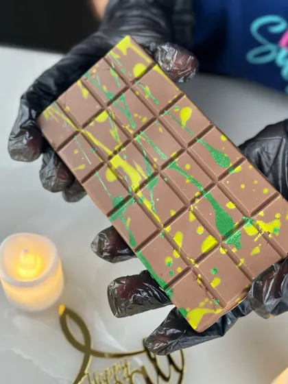 Our viral Dubai knafeh chocolate bar, with its unique green and yellow splatter design, is another exciting addition to our Diwali collection.