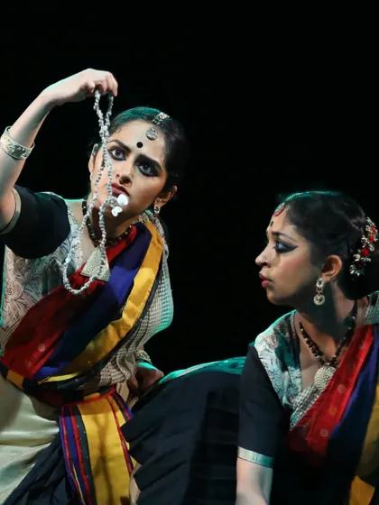 A close-up from 'Ikshana' depicting a moment of narrative tension. My choreography focuses on using detailed abhinaya and character interaction to convey complex emotional arcs within the larger theme of environmental consciousness.
