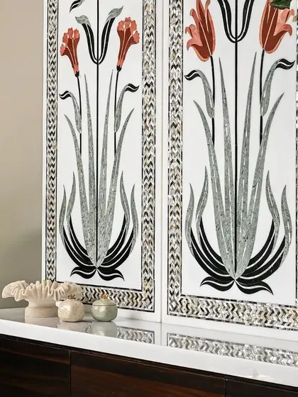 A close-up of the floral inlay artwork. This piece was the final work of a master craftsman, and it stands as a tribute to his incredible skill. It’s these human touches that give a home its soul.