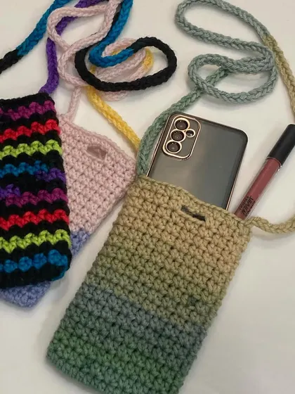 My crochet phone slings are big enough to hold your phone and a lipstick, making them the perfect minimalist accessory for a concert or a quick outing.