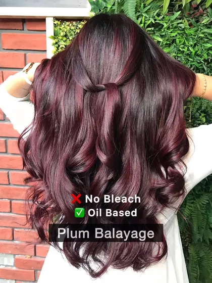 A beautiful Plum Balayage created with an oil-based, no-bleach formula. Just remember, reds require a bit of extra care to stay vibrant.