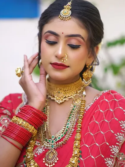 A close-up showing the soft, blended eye makeup and perfectly defined winged liner. This is a classic bridal eye look that enhances the shape of the eyes.