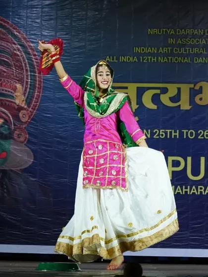 A series of photos from a Gidha performance at a national competition in Pune, showcasing the colorful costumes and lively spirit of this Punjabi folk dance.