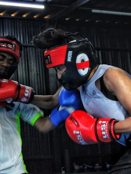 Trading blows in the pocket. Close-range sparring like this builds toughness and teaches fighters how to protect themselves while looking for opportunities to counter.