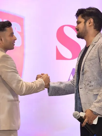 A handshake signifying a successful partnership and event. I work closely with event organizers to ensure their vision for the night is executed perfectly.