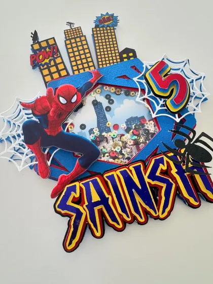 Another angle of the action-packed Spiderman topper, showing the depth and complexity of the handmade layers.