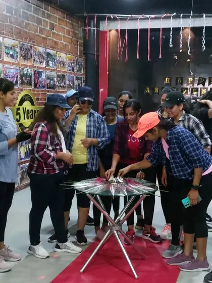 A special cake cutting ceremony to celebrate Women's Day at our studio. It's a day to honor the strength and spirit of all the amazing women in our community.