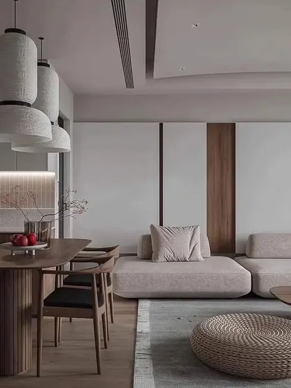 A cohesive view of the open-plan living and dining space, demonstrating a harmonious blend of modern design and natural elements.
