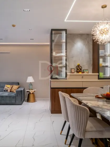 This view connects the dining area to the living room, showcasing an open layout perfect for modern family life.