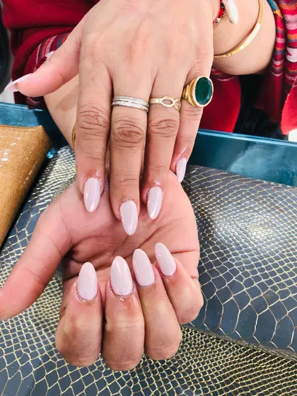 Another view of the elegant pearl chrome nails.