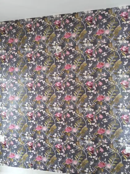 A beautiful floral wallpaper with pink and white blossoms on a dark background. This high-contrast design makes a bold and elegant statement.