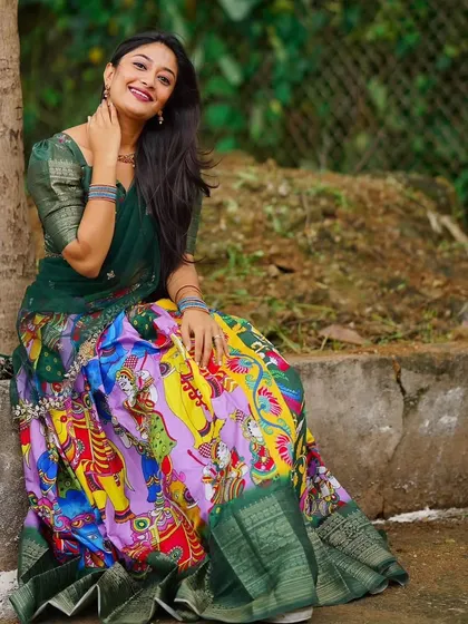 A happy client enjoying the comfort and beauty of my rental Langa Davani. The green blouse perfectly complements the colorful skirt.