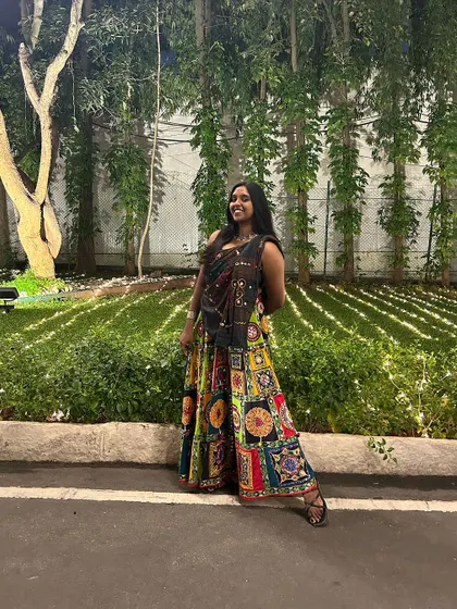 Posing with my Dandiya outfit. I teach authentic steps for both Dandiya Raas and Garba, ensuring your performance is both fun and culturally rich.