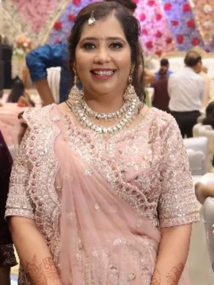 A close-up portrait of the sister of the groom.