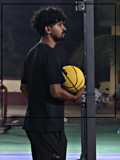 A focused coach, ready to lead the next drill. We believe that great players are built by dedicated mentors.