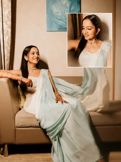 A modern bridal portrait. The bride looks elegant in her light blue saree, with an inset close-up capturing her happy, sparkling smile.
