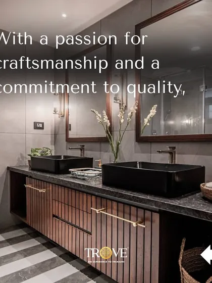 This bathroom showcases a modern, sophisticated aesthetic. The large-format grey wall tiles and striped floor tiles create a clean, seamless look, while the wood vanity adds warmth. It’s a perfect blend of craftsmanship and quality.