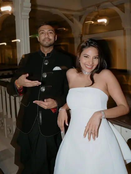 A playful couple shot. Her makeup is designed to look great in person and in photos, all night long.