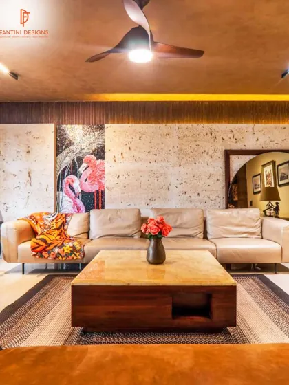 A closer look at the living area, highlighting the textured stone wall and the vibrant flamingo artwork. I love using natural materials and bold art to give a space personality.