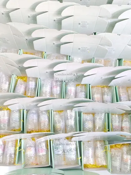 The final stage of a large housewarming order, with the gift boxes packed and ready for shipping.