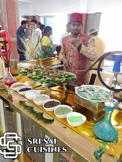 My Sweet Paan Station, complete with hookahs and a server in a traditional fez hat. This setup is perfect for adding a classic yet stylish touch to any event.