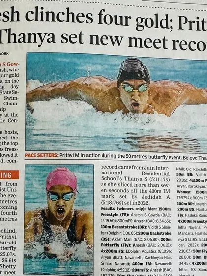 A Times News Network article celebrating Aneesh clinching four golds and Prithvi setting a new meet record.