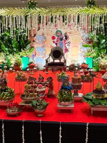 A full stage view of my platter decoration on a red carpet. This setup for a traditional function shows how the platters become an integral part of the overall event design.