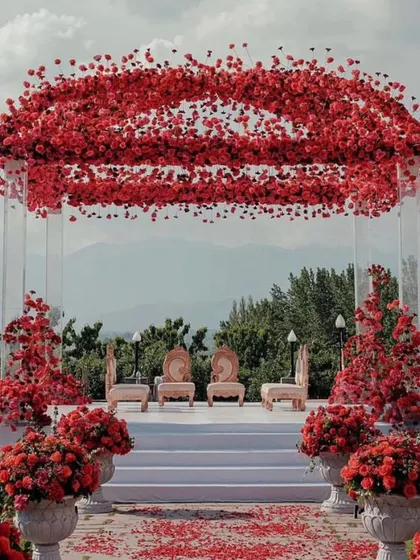 For a couple that wanted something bold and unique, I created this stunning mandap with a canopy of red roses shaped like lips. This is a perfect example of how I turn your personal style into unforgettable decor.