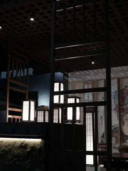 A detail shot showing the 'Ebisu' branding and the cluster of Japanese lanterns, key elements of our pop-up restaurant design at the India Art Fair.