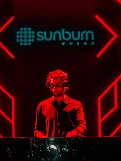The red lighting at Sunburn creates an intense and focused atmosphere.