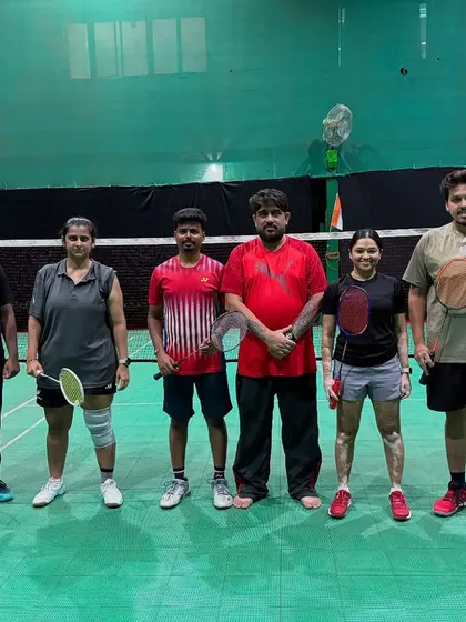 Players and coaches gather for a photo before the matches begin.