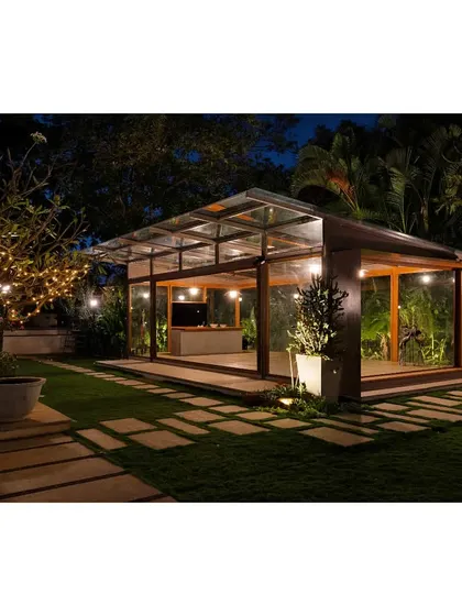 The Komorebi Pavilion, seen here at dusk, is a glass sanctuary designed to dissolve into its garden setting. It's a space for quiet reflection, where the boundary between inside and out is intentionally blurred, allowing you to feel fully enveloped by nature day and night.