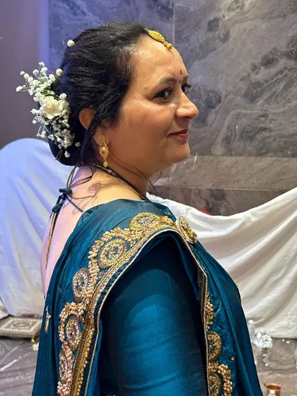 Another angle of the mother-of-the-bride's bun, showing how the flowers are arranged.