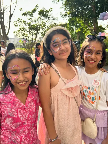 All smiles and glitter at this Taylor Swift-themed birthday party! These girls had a blast getting their faces decorated with sparkles and hearts.