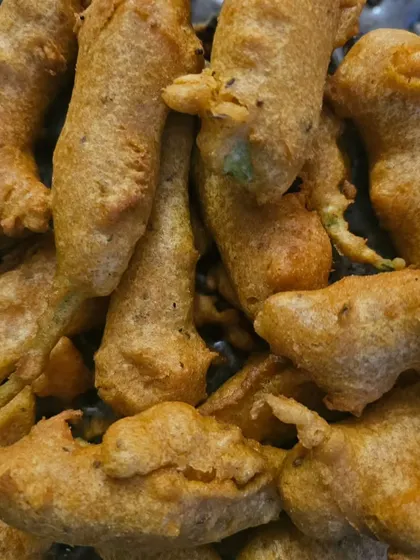 Freshly fried Mirchi Bajji (chili fritters), a spicy and popular Andhra snack.