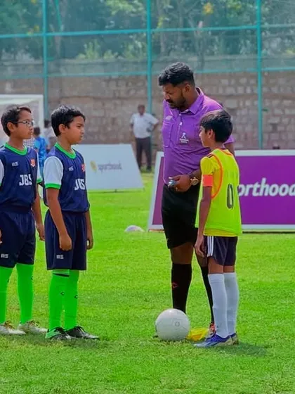 Players lining up before a KSFA Youth League match. We teach sportsmanship and respect for the game, opponents, and officials.