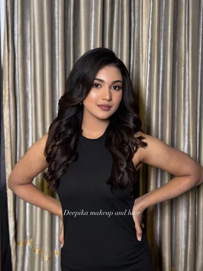 A confident pose showing off the full effect of the soft glam makeup and hairstyle. This look is all about looking like the best version of yourself.