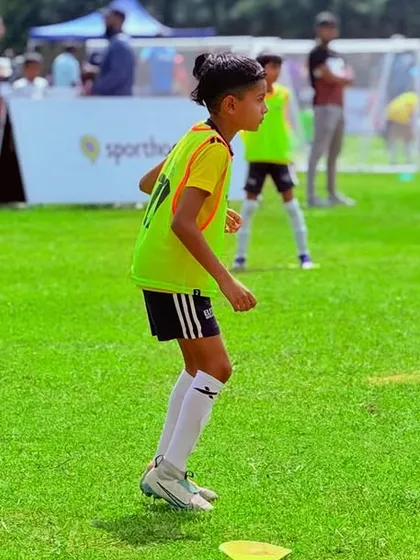 A player ready to receive the ball. Awareness and positioning are key skills we emphasize for competitive play.