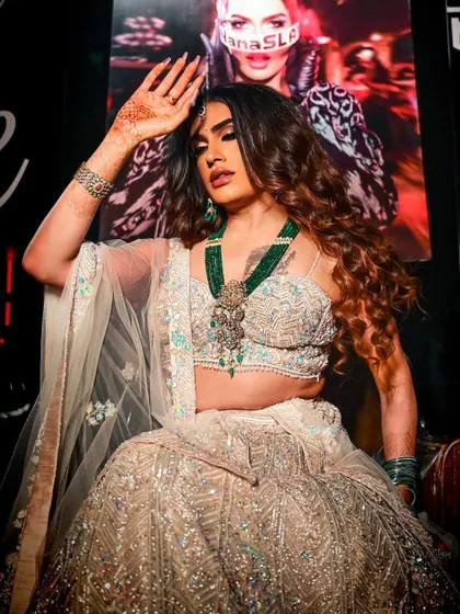 Another angle of the glamorous lehenga look for Sushant Divgikr. The focus was on glowing skin, a defined eye, and a lip color that tied the whole look together.