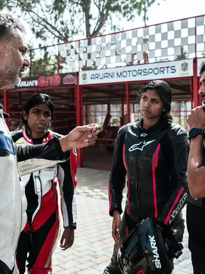 Our coaching goes beyond just track time. Here, one of our expert instructors provides detailed feedback to participants of the Petronas TVS Racing women’s selection rounds, focusing on technique and strategy.